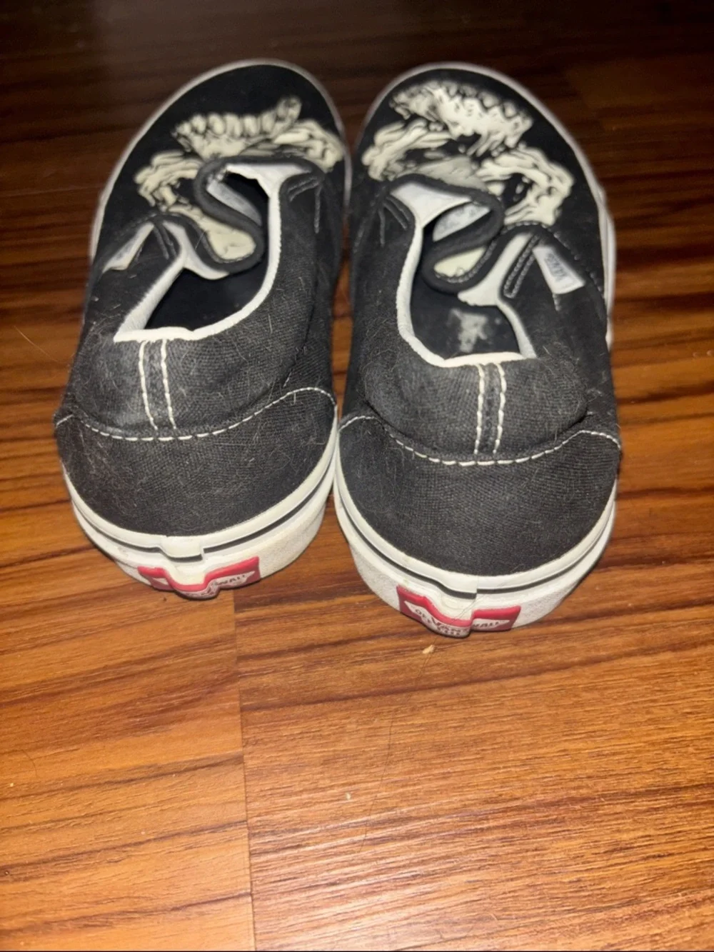 Vans Black & White Slip-On Skull Graphic Sneakers - Picture 3 of 3